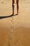 Walking on the Wet Sand