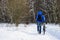 Walking winter cyclist