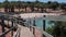 Walking on a wooden footbridge towards the beach