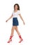 Walking Young Woman In Jeans Mini Skirt And Red High Heels. Side View