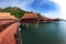 Walkway above water towards beautiful chalet