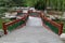 Walkway across the river in Old traditional park in Beijing, China