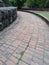 The walkway around the pagoda is made of bricks.