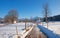 walkway Bad Wiessee, view to church and bavarian alps, winter landscape bavaria