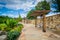 Walkway, bench and gardens at Elizabeth Park, in Elizabeth, Char