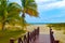 Walkway leading to a palm fringed beach in Varadero, Cuba