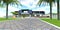 Walkway made of gray concrete shaped blocks with white curb on the green meadow in the yard of the contemporary estate in