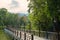 The walkway over the river heading into the park