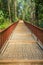 Walkway into the publuc temple in the forest that constructed with brick floor and steel fence