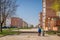 A walkway through soviet built apartment blocks in Sillamae in Estonia on a sunny day