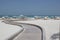 Walkway to idyllic beach with pure white sand