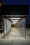 Walkway underneath a scaffolding on Manhattan`s Upper East Side at night, New York City