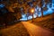 Walkway on Vysehrad fortification walls illuminated by street lamps by night. Prague, Czech Republic