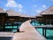 Walkway with water bungalows on both sides in Maldives