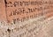 Wall of Ayrivank rock monastery with ancient armenian inscription