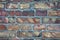 Wall background from old bricks. Cracks, damage, scratches on dirty bricks.