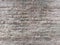 Wall background textured made using cement and the color is grey.