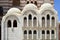 wall with a beautiful texture of a Muslim Islamic Arab mosque made of white bricks is an architectural structure with arches, dome