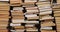 Wall of books in a pile