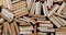 Wall of books in a pile