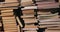 Wall of books piled up