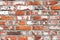 Wall of bright old red brick as beautiful loft-style background for modern interior design