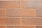 Wall of brown plates texture bricks