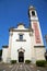 Wall and church tower bell sunny day tradate