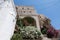 Wall on a cliff in Apiranthos, the marble village