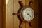 Wall clock in the shape of naval helm