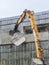 Wall dismantling for factory reconstruction with industrial crushing shears