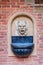 Wall fountain at Collegium Maius Great College courtyard of the Jagellonian University in Krako