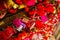 Wall full of red and pink love locks shaped as hearts