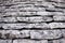 Wall of gray texture stones, background