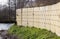 Wall with holes, nests for swallows