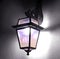 Wall lantern shining pink and purple