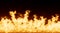 Wall of large Fire with a light reddish glow on dark