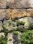 Wall with large fitted moss covered stones at a shrine in Nikko, Japan