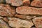 A wall of large rough-hewn rocks