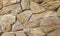 Wall from large stones background texture, stone slate wall concrete grout, rock