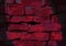 wall light red texture hand made. Wall brick red neon ambiance background