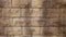 The wall is made of brown street bricks with a curtain plan.