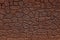 Wall made â€‹â€‹of bricks color of rusty iron