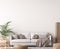 Wall mockup in living room design, White sofa in Scandinavian interior