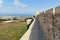 Wall in Naryn-Kala fortress and view of Derbent city.