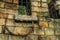 Wall of old brick and lattice on window