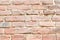 Wall of an old red brick. Close up
