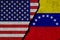 Wall with painted united states and venezuela flags