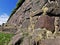 The wall of the Panzerlaks Bastion, built in the 16th century, in the city of Vyborg on a clear summer day