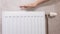 Wall radiator in the room. Increasing the price of water heating. Comfortable temperature in the house, industry. Dry